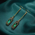 1+1 Offer: Green Lantern Pendant Earrings in Gold