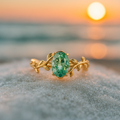Emerald Wind β Golden ring with green agate and leaf motif